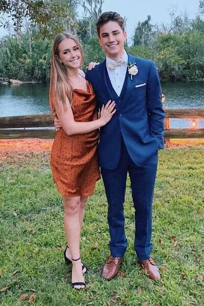 Carson Rowland and wife Maris Rowland attend a friend's wedding in December 2019.