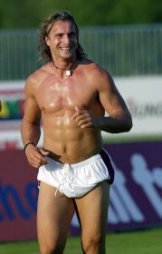 Footie ace Ginola cooling down after a game in 2001