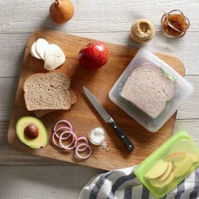 making sandwiches on a cutting board with Stasher sandwich bags
