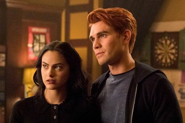 Camila Mendes as Veronica and KJ Apa as Archie in a scene from "Riverdale."