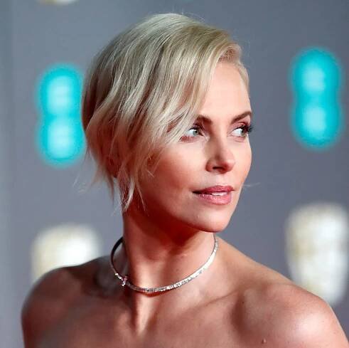 At 44, Charlize Theron Keeps Her Skin Glowing And Wrinkle-Free With Lots And Lots Of Sunscreen