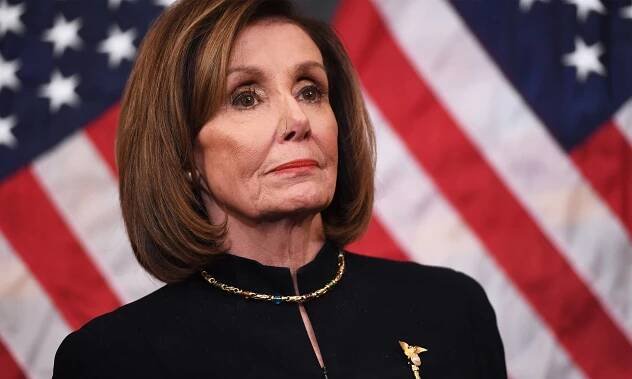 House Speaker Nancy Pelosi in a formal black dress standing amidst US flags Wallpaper