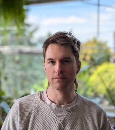 Photo of Travis Philyaw, PhD, first author on a study about genetically modified fruit flies and cocaine addiction.