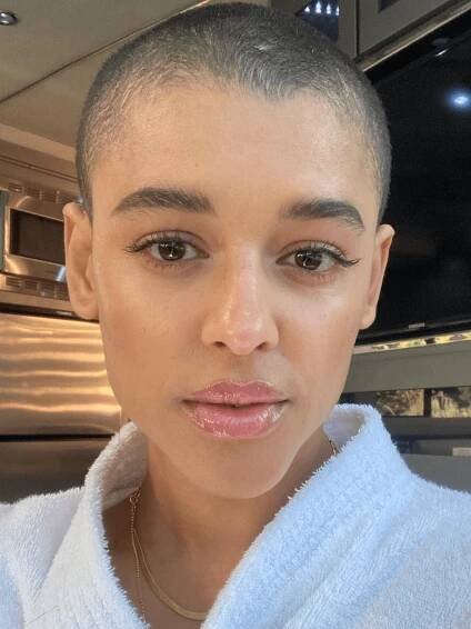 Jordan Alexander with a buzz cut hairstyle. 