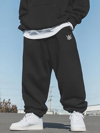 TEPLÁKY BAGGY Pánské ŠIROKÉ VOLNÉ Jigga KORONA Výšivka ČERNÁ M Značka Jigga Wear