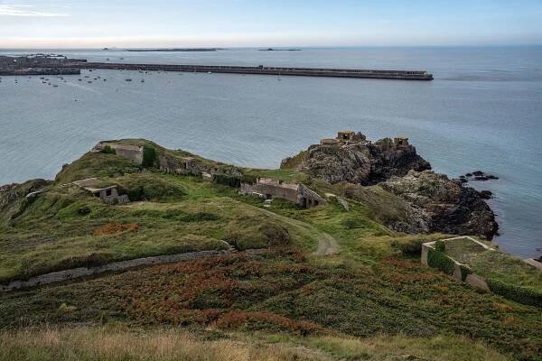 This quiet British island was once the site of Nazi atrocities. A new inquiry reveals its truths