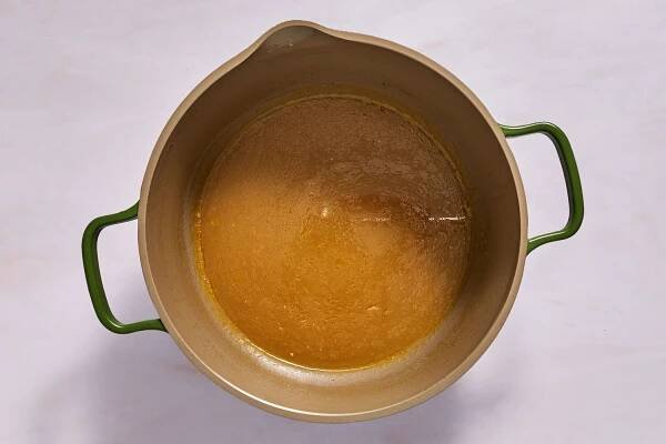 A pot of room temperature chicken stock