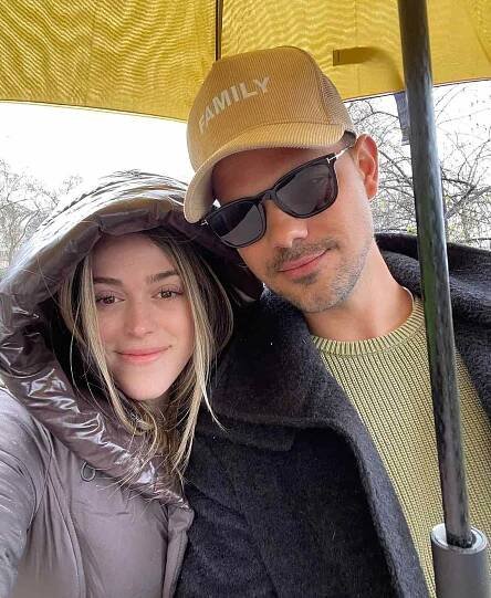 Taylor Lautner (right) and wife Tay
