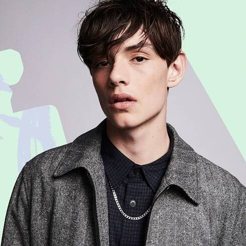 Enola Holmes' Louis Partridge On Millie Bobby Brown & More