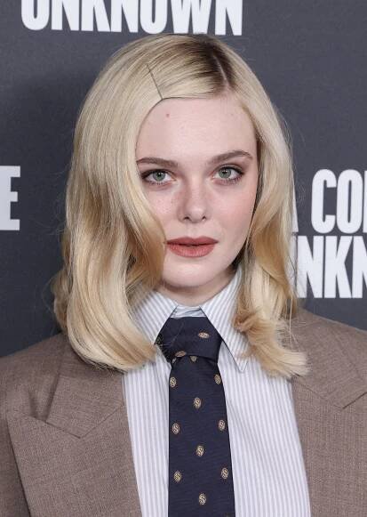 Elle Fanning attends the photocall for "A Complete Unknown" at The Curzon Mayfair on December 16, 2024 in London, England