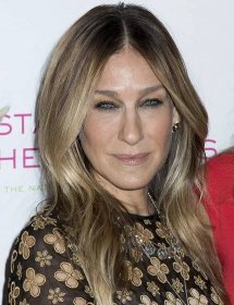 Sarah Jessica Parker's locks were parted down the middle and styled in soft waves