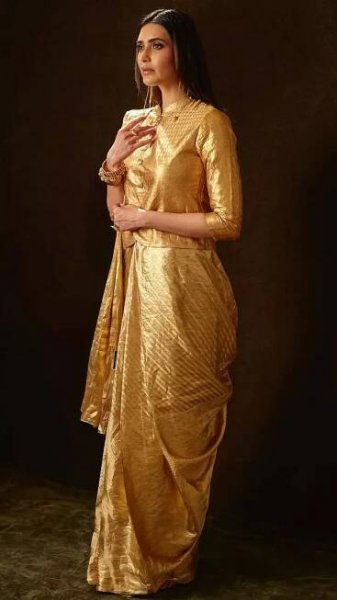 Karishma Tanna stuns in a breathtaking golden saree