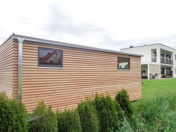Designový zahradní domek s deskami Fundermax - Realizace dřevostaveb | NATURLIVING®