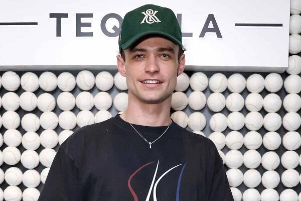 Thomas Doherty enjoys a Dobel Tequila cocktail at the 2024 US Open with Maestro Dobel Tequila, the Official Tequila of The US Open, at the USTA Billie Jean King National Tennis Center on August 27, 2024 in New York City.
