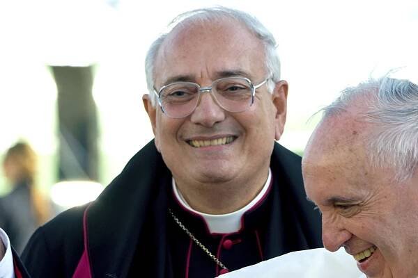 Brooklyn Bishop Nicholas DiMarzio as Pope Francis, right, arrives at John F. Kennedy International Airport in New York in 2015.