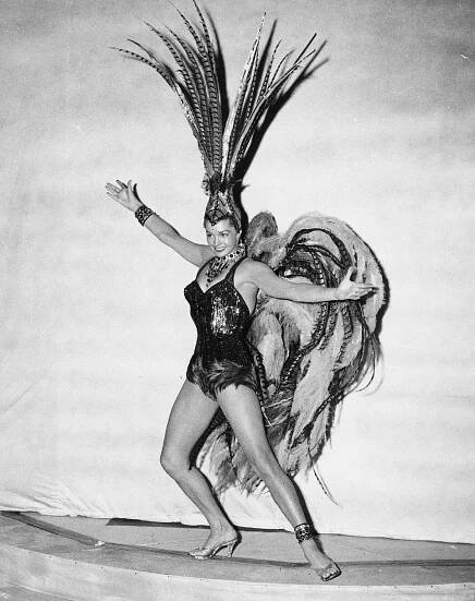 Swimmer And Actress Esther Williams, Wearing A Feather Showgirl Costume For The 'Aqua Spectacle Of 1956' Show, Empire Pool, Wembley, London, August 4Th 1956.