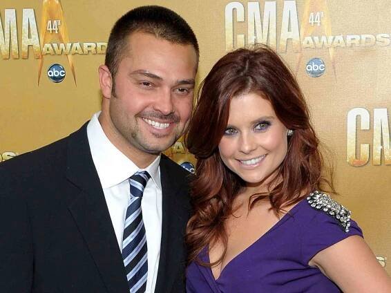 JoAnna Garcia and Nick Swisher attend the 44th Annual CMA Awards at the Bridgestone Arena on November 10, 2010 in Nashville, Tennessee