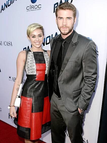 Miley Cyrus and Liam Hemsworth Relationship Timeline | Us Weekly