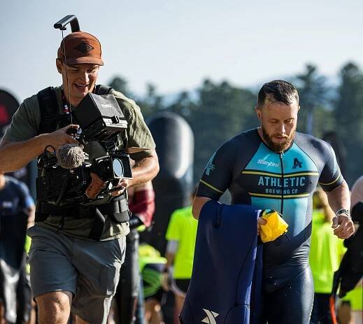 Cameraman runs with a camera