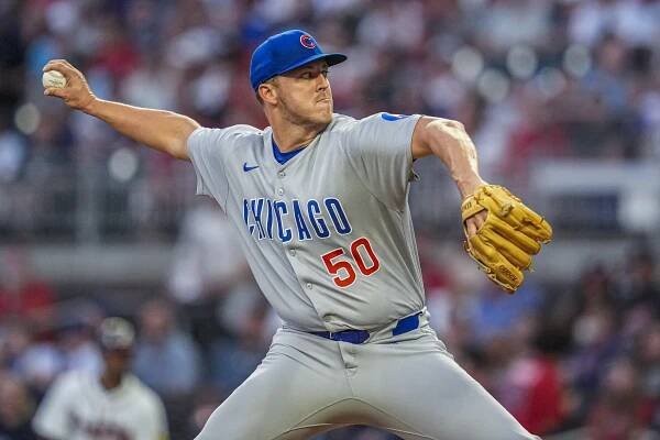 Jameson Taillon, Chicago Cubs pitcher, throwing a baseball.