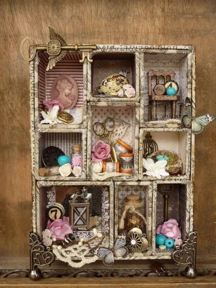 a dollhouse with many different items in it's display case on a shelf