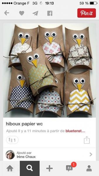an owl made out of brown paper wrapped in twine