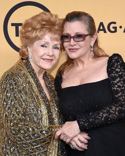 Debbie Reynolds, ‘Singin’ in the Rain’ star and Carrie Fisher’s mom, dies at 84