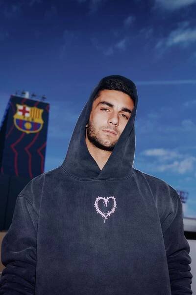 KAROL G Teams Up With Spotify and FC Barcelona To Release Special Matchday Shirts, Merchandise Collection, and Matchday