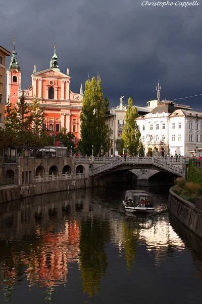 Ljubljana – the river Ljubjanica with the Church of The Annunciation in the background
