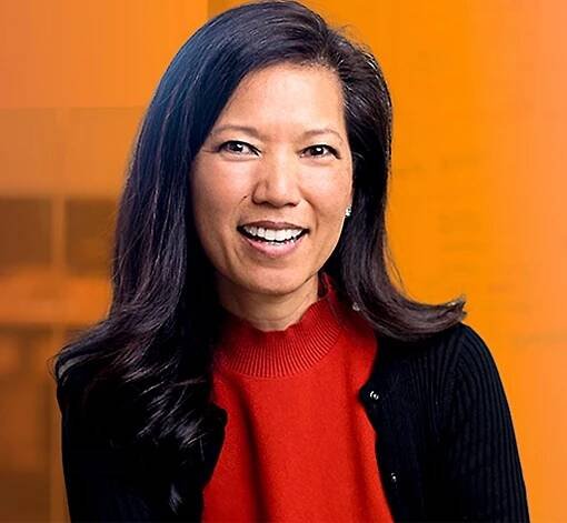 A close-up of a woman smiling.