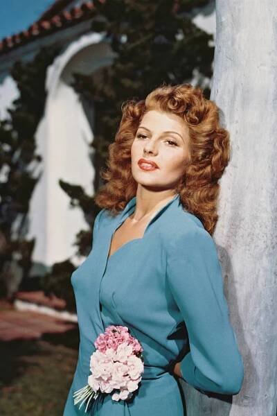 Rita Hayworth Against A Tree Wallpaper