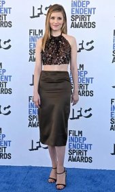 Dianna Agron flaunts her legs in a chocolate brown embellished top with a matching Duchesse pencil skirt and black satin sandals