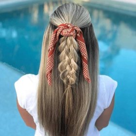 half up half down braid on blonde hair tied with a bandana