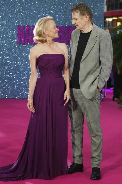 Pamela Anderson and Liam Neeson at "The Naked Gun" London premiere.
