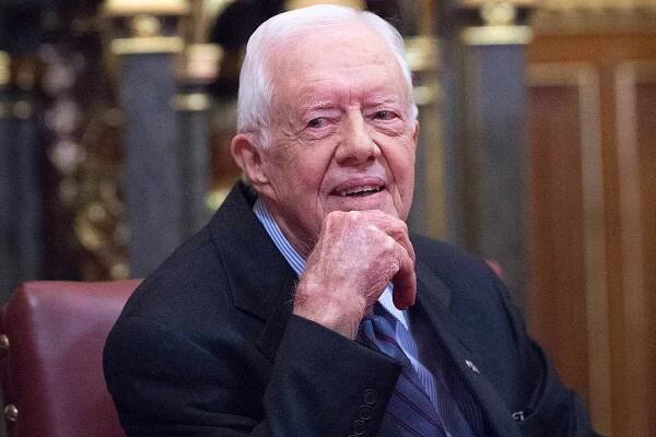 Former U.S. President Jimmy Carter receives delivers a lecture on the eradication of the Guinea worm, at the House of Lords on February 3, 2016 in London. 