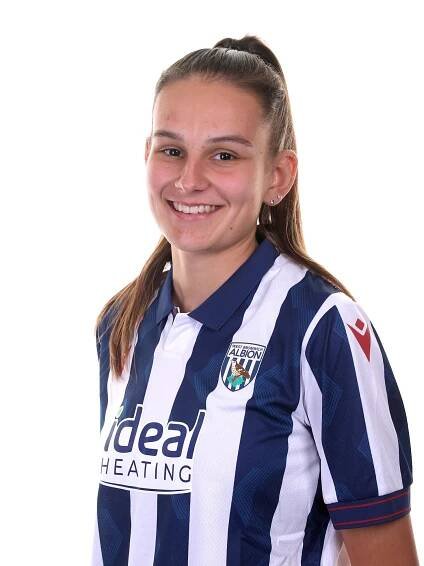 A headshot image of Izzy Green