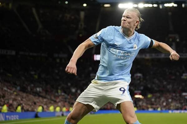 FILE - Manchester City's Erling Haaland celebrates after scoring his side's opening goal from a penalty kick during the English Premier League soccer match between Manchester United and Manchester City at Old Trafford stadium in Manchester, England, Sunday, Oct. 29, 2023. (AP Photo/Dave Thompson, File)