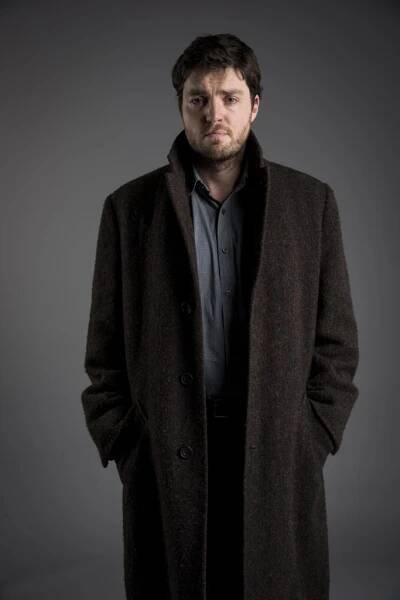 Tom Burke as Cormoran Strike - StrikeFans.com