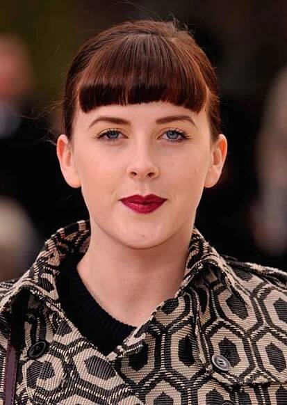 Short and Straigt Hairstyles with Bangs  Actress Alexandra Roach has chosen a short haircut and straight bangs, which exudes strong retro vibes.