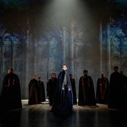 Camelot Lincoln Center. Andrew Burnap (center) and company. Photo by Joan Marcus.