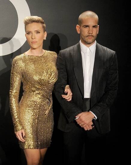 Scarlett Johansson and Romain Dauriac at a store opening.