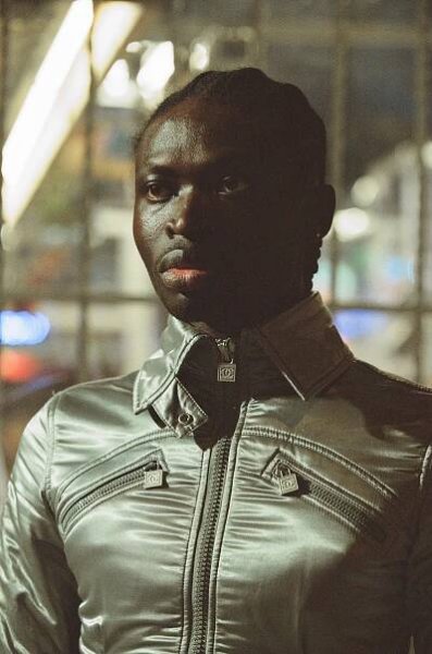 MODEL — Isaak Adoyi