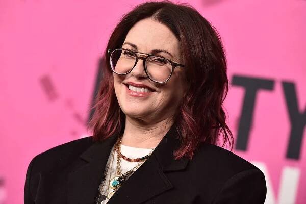 Megan Mullally Recounts Her 'Really Creepy' Job Modeling Shoes for Men in a Hotel Room: 'It Was Not Cute'