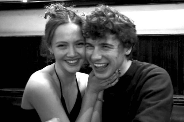Iris Apatow and boyfriend Sam Nivola smile in a photo together in May 2024.