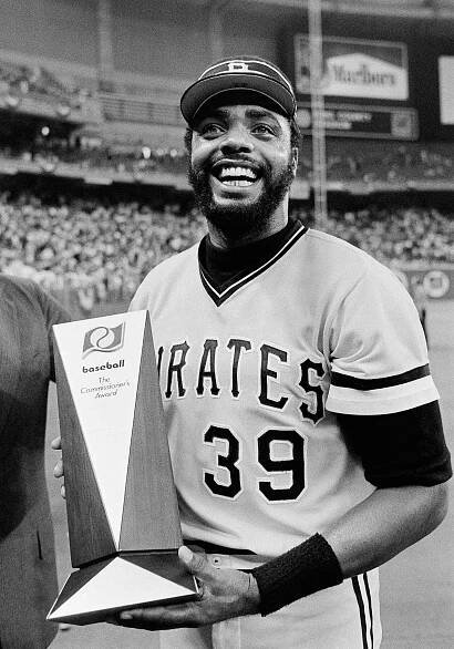 Dave Parker of the Pittsburgh Pirates holding the Commissioner's Award.
