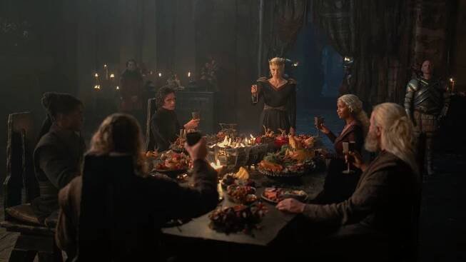 Addam of Hull (Clinton Liberty), Jacaerys (Harry Collett) Rhaenyra (Emma D'Arcy), Baela (Bethany Antonia), Ulf (Tom Bennett) and Hugh Hammer (Kieran Bew) seated around the dining table in the &quot;House of the Dragon&quot; season 2 finale