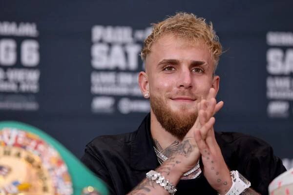 Jake Paul smiles during a press conference at Madison Square Garden, promoting his fight against Hasim Rahman Jr.
