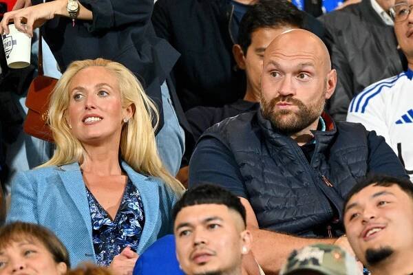 Paris Fury and Tyson Fury at a soccer match.