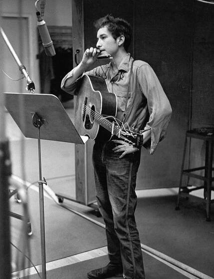 Bob Dylan between takes in the recording studio.