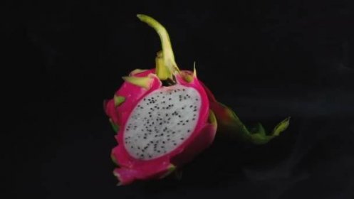 Video rotující exotické ovoce na černém pozadí — Stock záběr